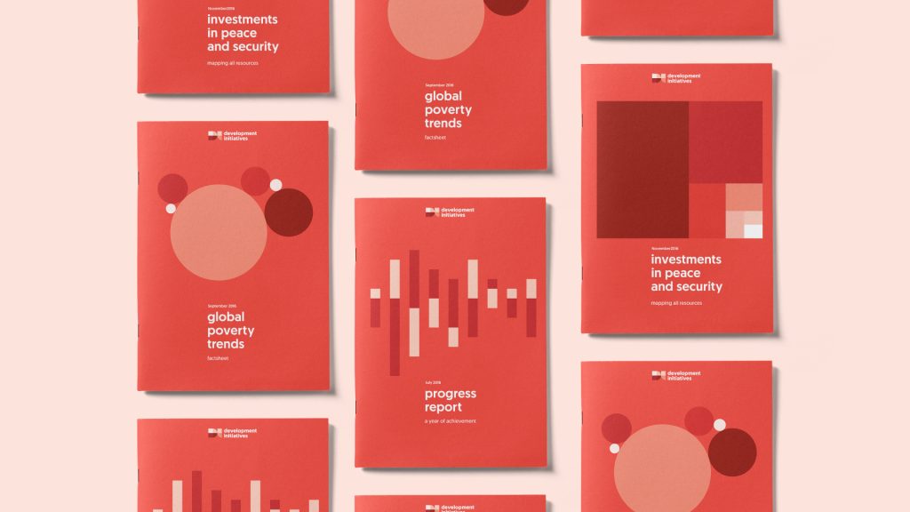 A collage of red Development Initiatives branded publication covers.