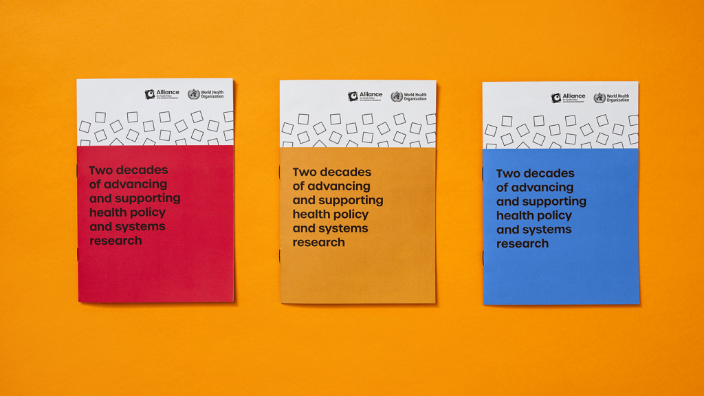 Three publication covers in (from left) red, yellow and blue.