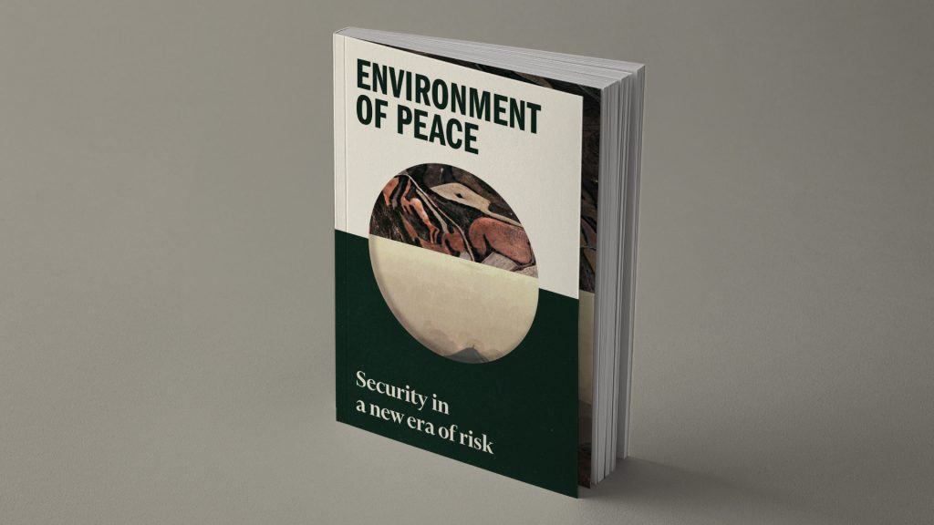 A mock-up image showing the cover of the Environment of Peace Report alongside a subtitle that reads 'Security in a new era of risk'