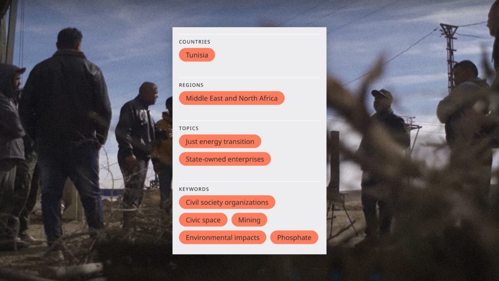 The filters from the new NRGI website, showing countries, regions, topics and keywords. The filters are in a box on top of a background photograph showing a group of people.